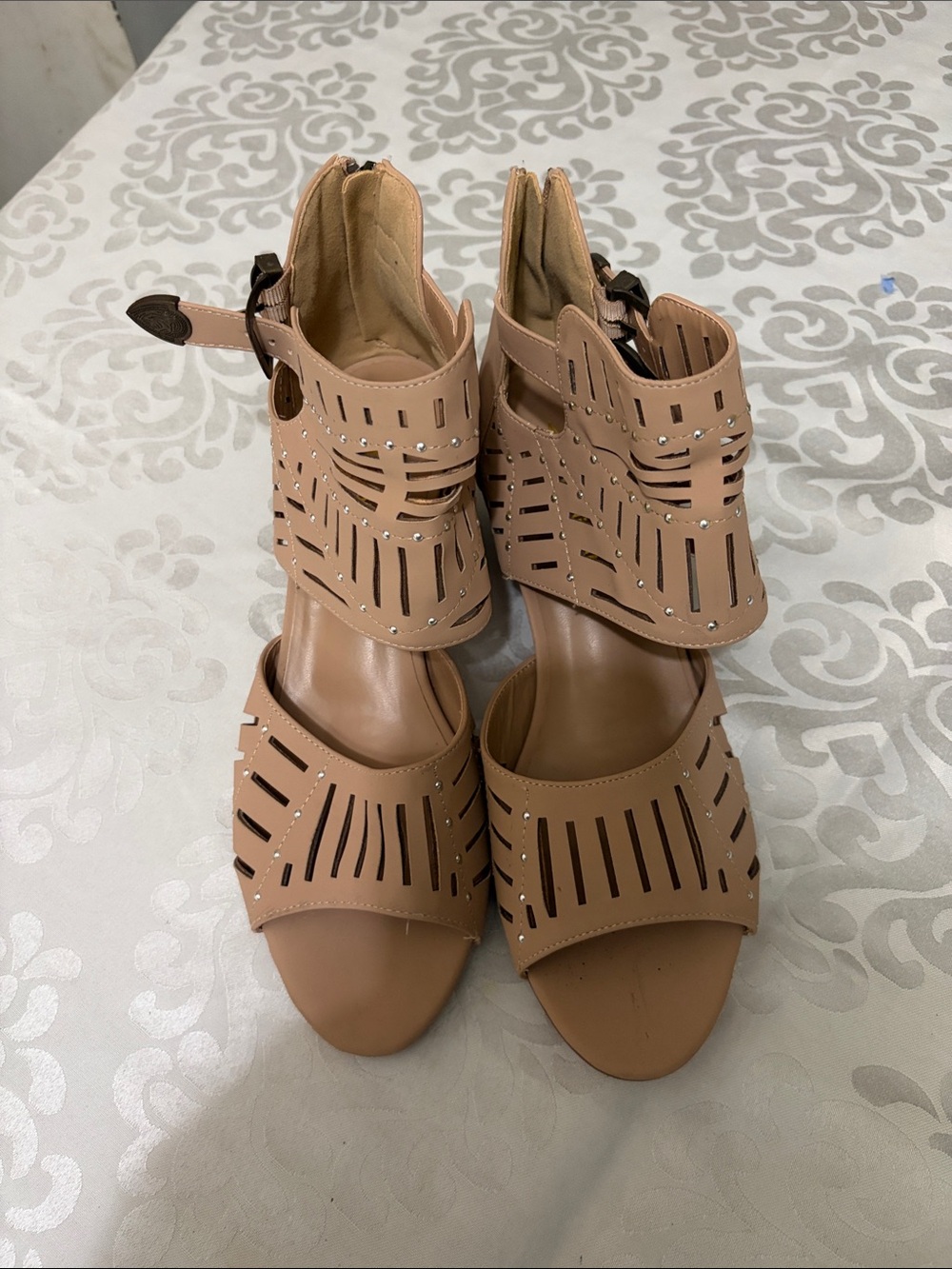 Nude Laser-Cut Ankle-Strap Heels with Rhinestone Detail